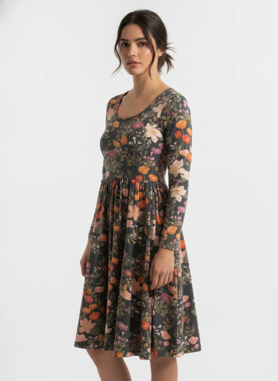 On-model three-quarter shot of a navy floral dress