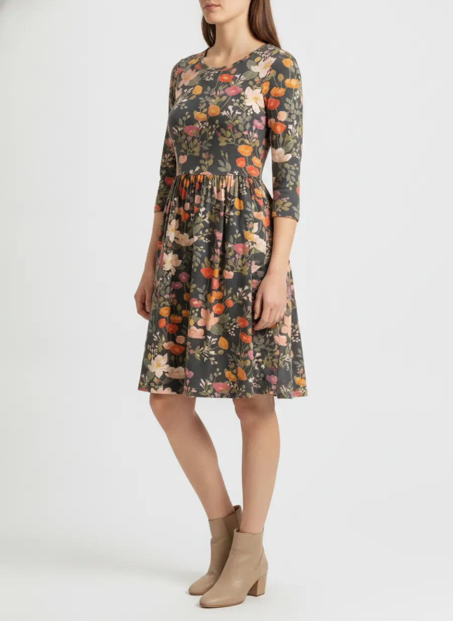 On-model faceless shot of a navy floral dress