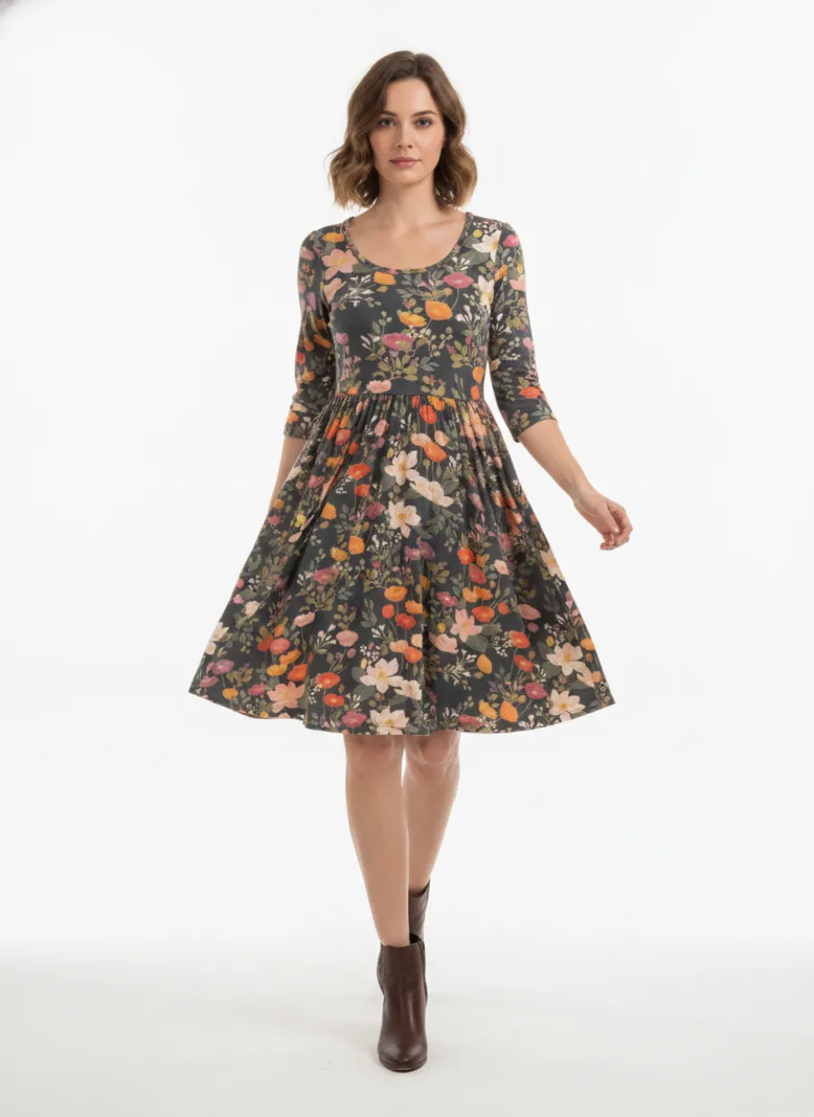 On-model in-motion shot of a navy floral dress